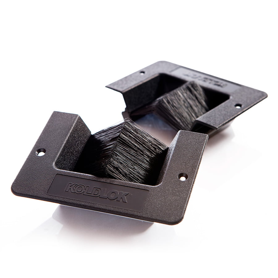 Occultation des trous passe-câbles par boîtiers encastrables